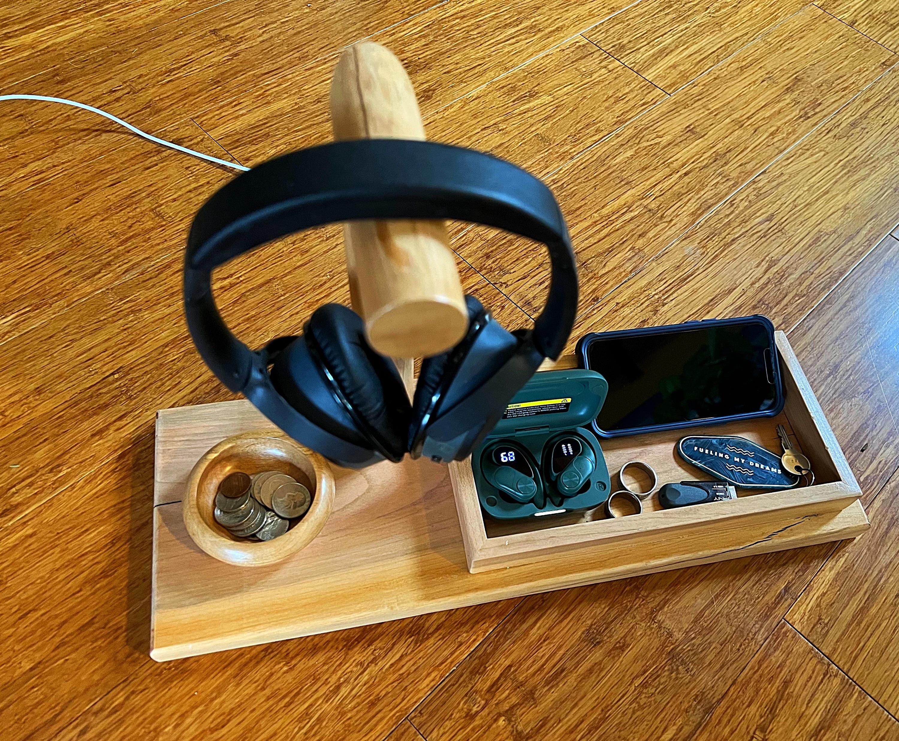 Headphone stand with change holder and cell phone charging station