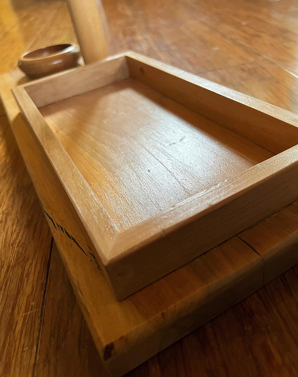 Headphone stand with change holder and cell phone charging station