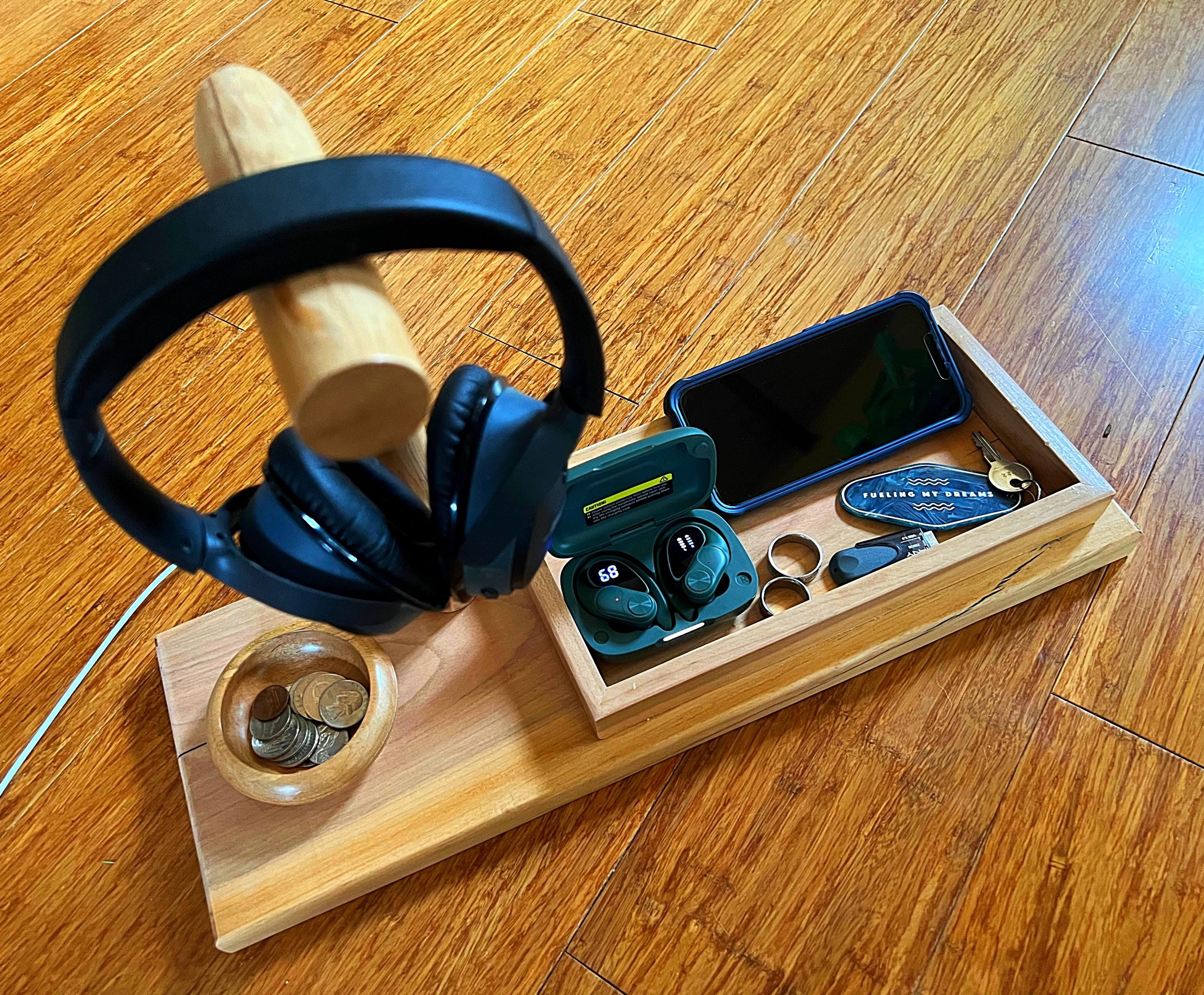 Headphone stand with change holder and cell phone charging station